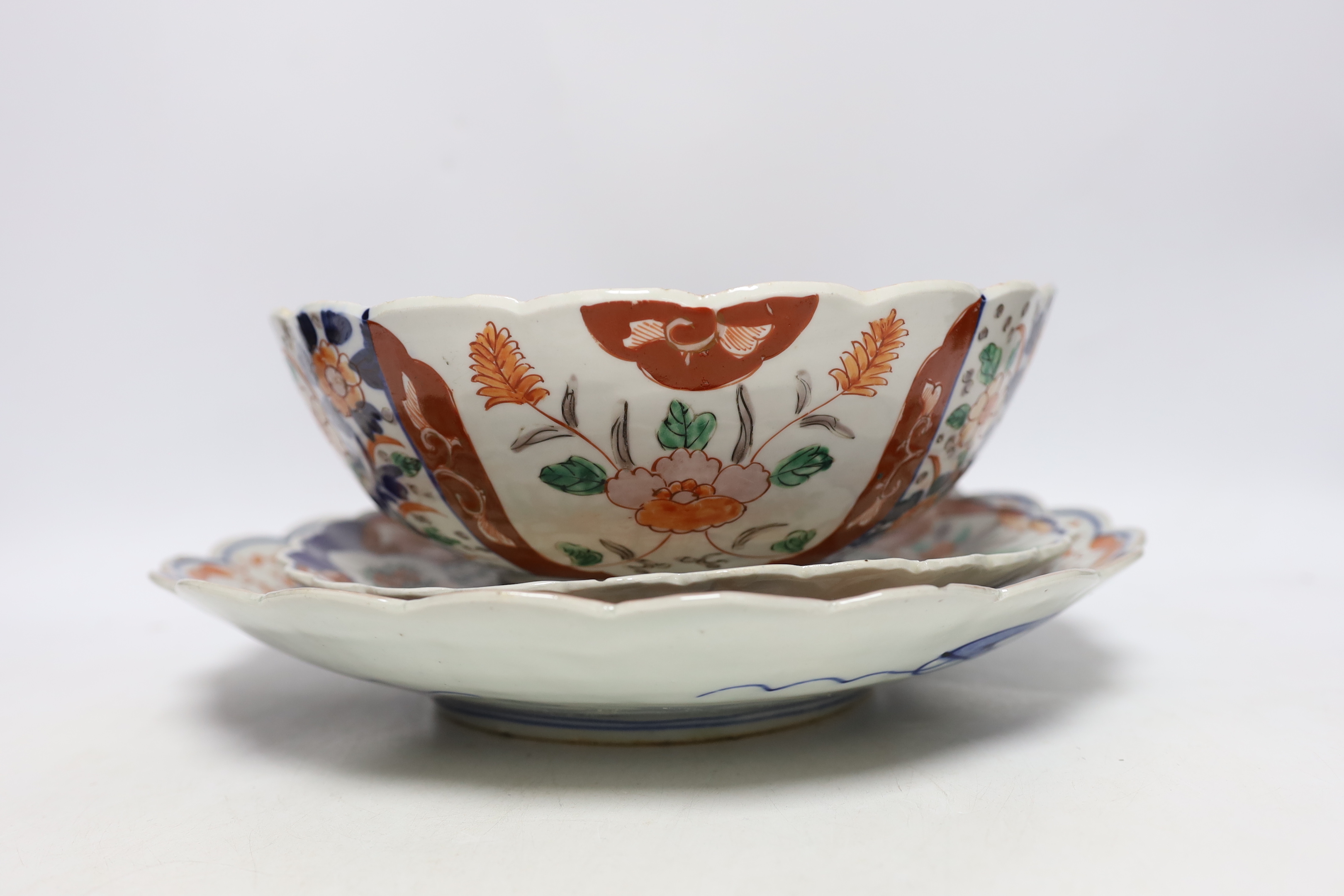 A group of Japanese Imari plates, dishes, a bowl and a vase